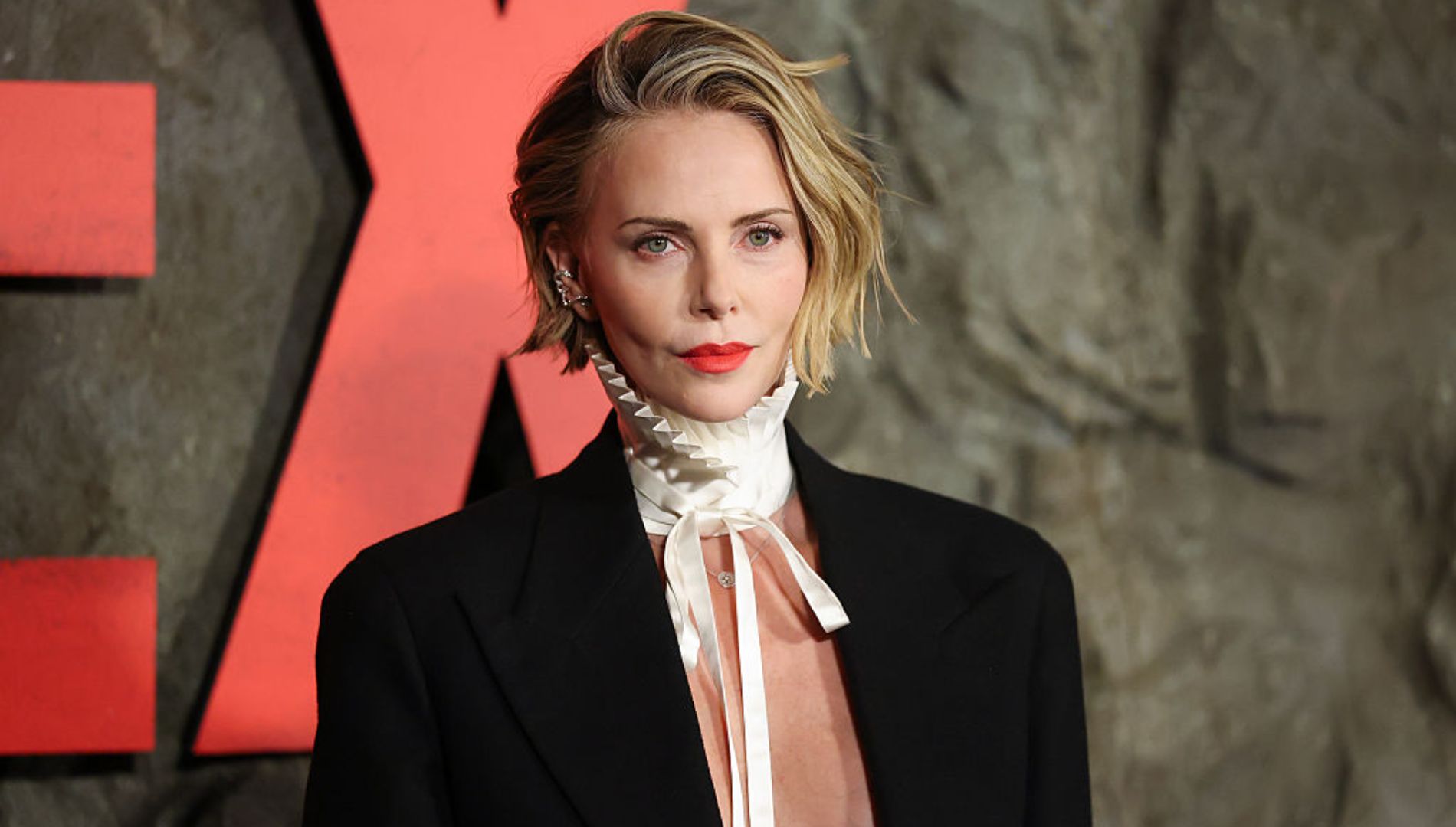 Charlize Theron Shines at the Apex Premiere